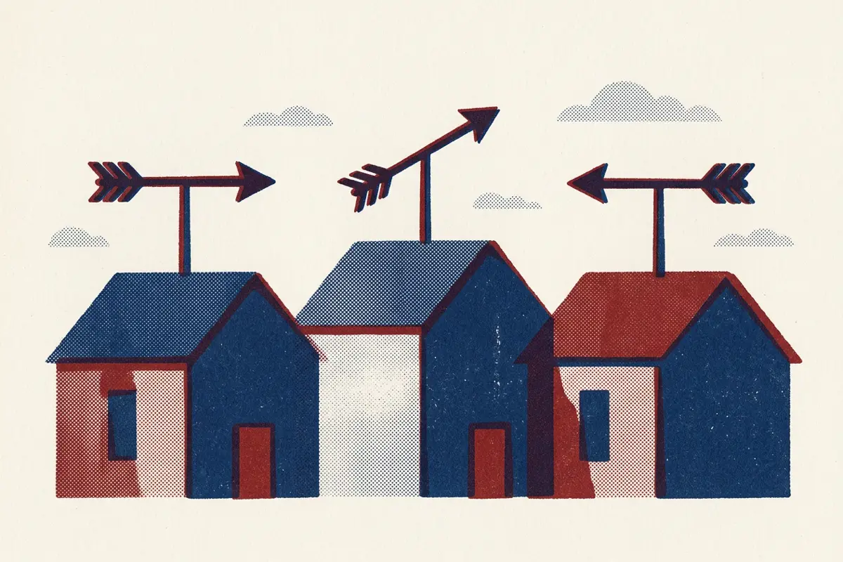 Three weather vanes on neighbouring rooftops pointing in slightly different directions.