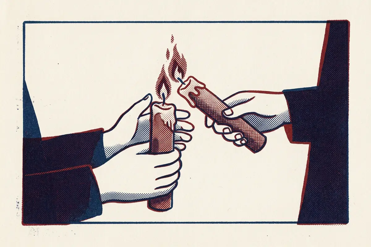 One candle lighting another as it is passed between two pairs of hands.