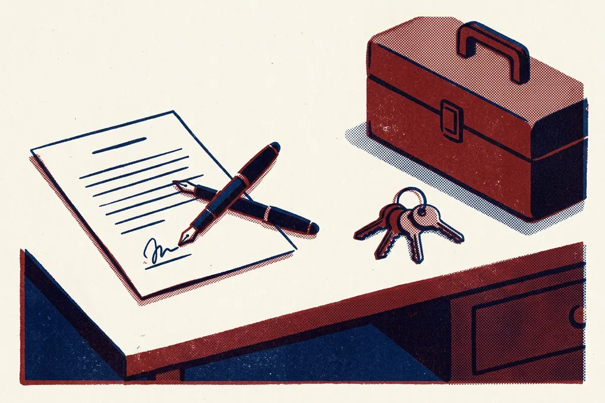 A signed contract and fountain pen on one side of a desk, with keys and a toolbox on the other.
