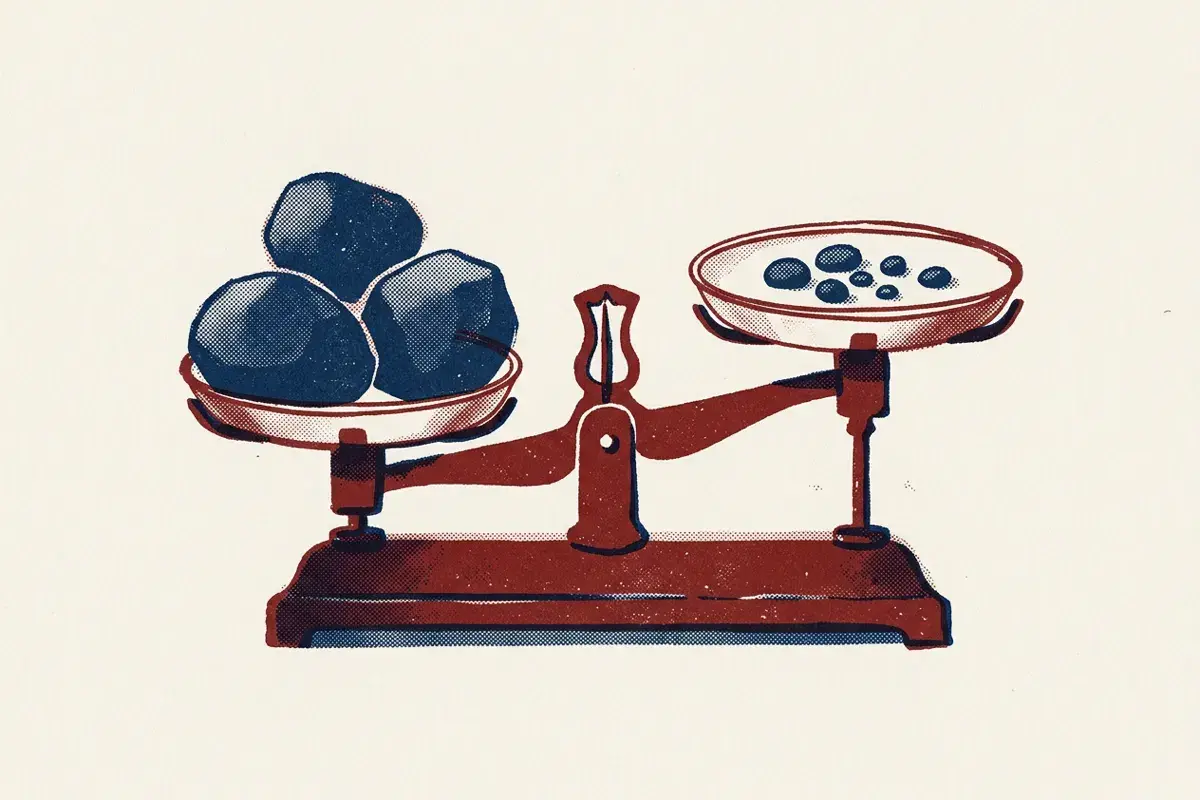 A balance scale tipped towards three large stones, outweighing five small pebbles.